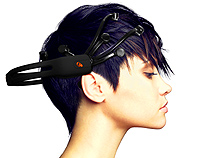 Brain Control. Profile photo of a woman wearing an Emotiv headset on her head.