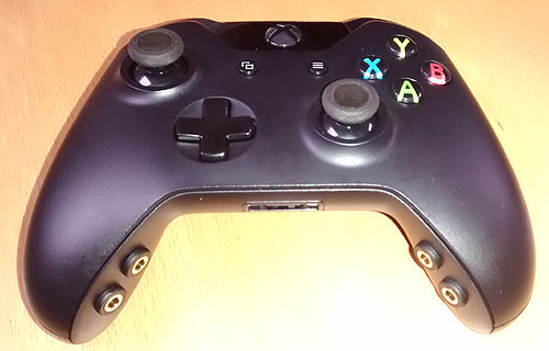 Xbox One original style joypad adapted for lighter use and switch access.