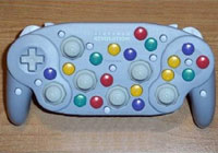 Joke image of a Joy Pad controller with about 30 buttons.