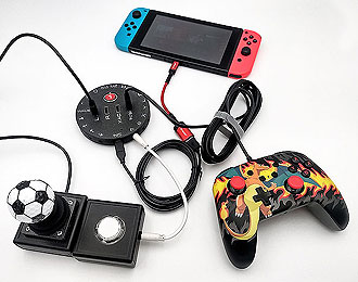 CATCH 22 HID Remapper v3 for the Nintendo Switch. Small black interface with 22 sockets. 