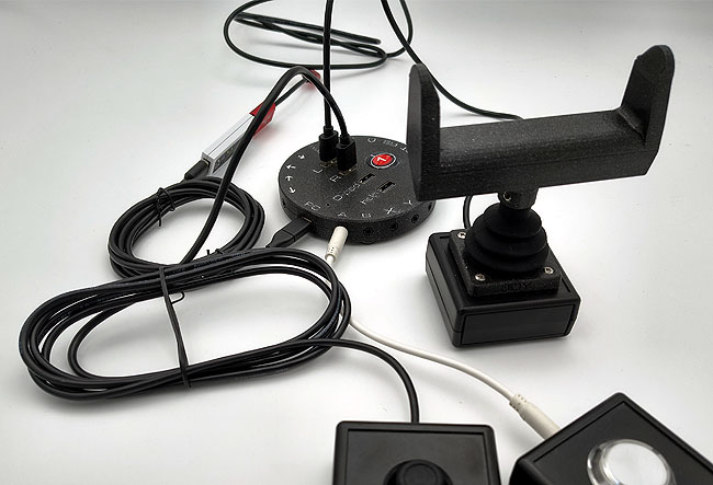 Catch 22 interface (HID Remapper v6) with various switch and joystick accessories.