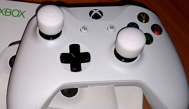 Xbox One lightweight controller with thumb-stick extensions.