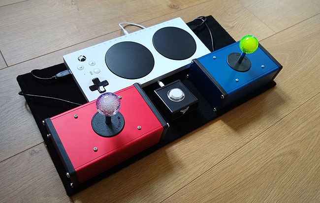 Ultrastik analogue joysticks in aluminium boxes with an Xbox Adaptive Controller.