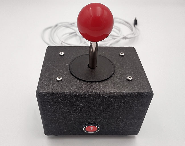 Red ball top Magnastik as four accessibility switches.