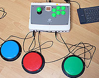 C-SID: Switch Interace Deluxe, adapted Dreamcast arcade stick with accessibility switches.