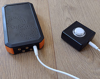 Switch Sound Box in orange and black.