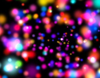 Cause and Effect: Lightbox image of coloured speckles.