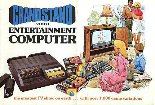 Drawn picture of a boy and girl playing a Grandstand Video Entertainment Computer (which is a rebranded Fairchild Channel F console. The wooden TV cabinet holds a TV playing a maths game with a lamp on top. A man and woman look on smilingly. A photo of the Grandstand Video Entertainment Computer with games has the text 