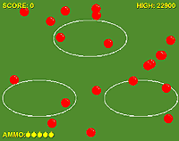 Three thin white hoops in a green back ground. Scattered red balls all around.