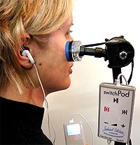 Accessibility Standard Switch being used with a switch accessible iPod (Technical Solutions Australia).