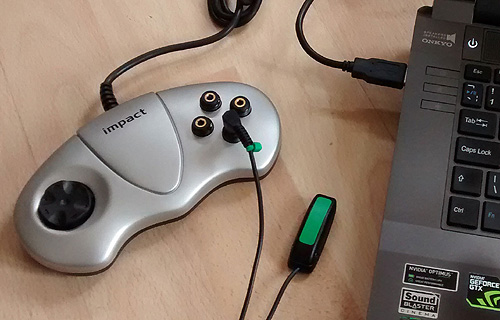 impact joypad with a green switch attached to socket 1.