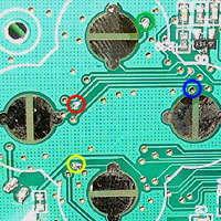 Flip side of Rock Band drums PCB. Coloured solder points.