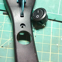 5. Neat hole drilled on a Scalextric hand-set for the on/off switch.