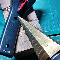 5. Stepper drill bit and pilot hole marked on the Scalextric handset.